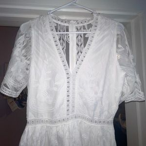 I’m not sure of the brand name, it’s a size small and it’s never been worn.